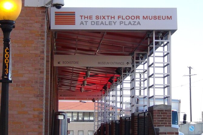 1-Hour JFK Assassination Walking Tour - Dealey Plaza viewpoints: Grassy Knoll, picket fence, and the theories