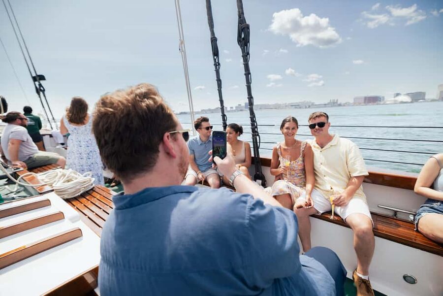 Boston: Downtown Harbor Sailing Cruise - Onboard vibe: crew energy, seating, and first-time sailing comfort