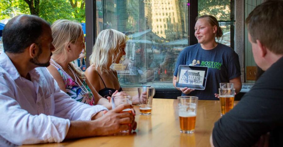 Boston: History Pub Crawl Tour Along the Freedom Trail - At Faneuil Hall Square, find the Sam Adams statue and the Boston Crawling sign