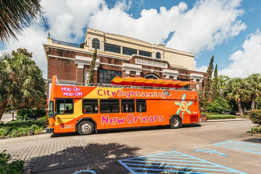 City Sightseeing New Orleans HOHO Bus Tour & Bookable Extras - French Market and neighborhood flavor: Marigny, Bywater, Frenchmen Street, and Treme