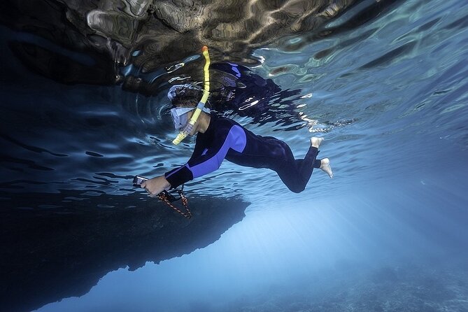 Dolphin, Sea Cave & Captain Cook Snorkel Combo in Kealakekua Bay - Captain Cook Monument reef snorkeling, and why timing matters