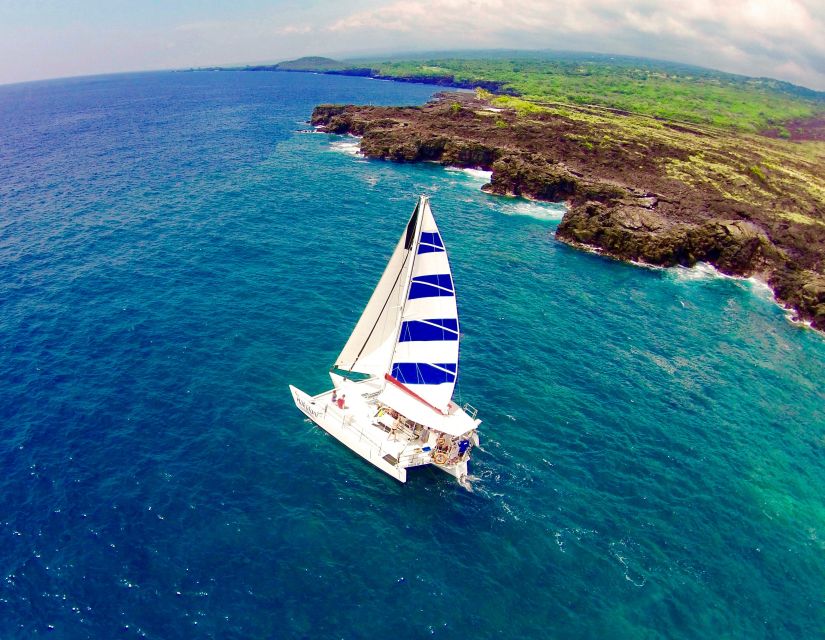From Keauhou Bay: Snorkel Cruise to Captain Cook's Monument - The Kona coast sail: coves, rock views, and dolphin odds