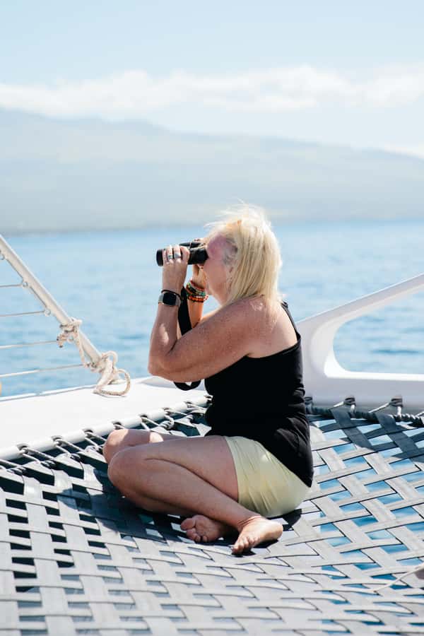 From Ma'alaea: 'Alihilani Sunset Sail Catamaran Tour - The onboard vibe: open deck, trampoline seats, and covered comfort