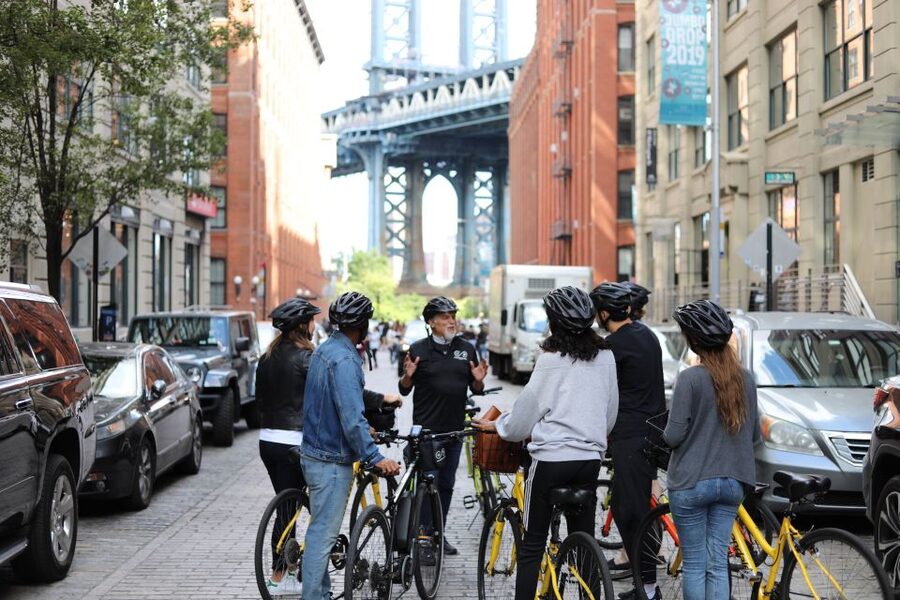 From Manhattan: 2-Hour Brooklyn Bridge Bike Tour - The downtown warm-up: Pace University, Woolworth Building, and Chinatown