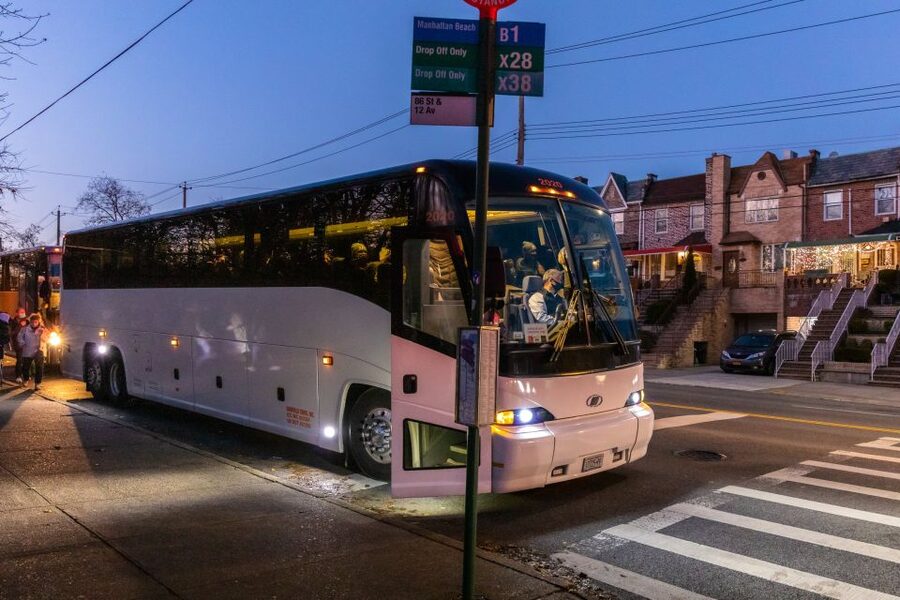 From Manhattan: 4-Hour Dyker Heights Holiday Lights Bus Tour - Brooklyn Bridge Park and the DUMBO photo window