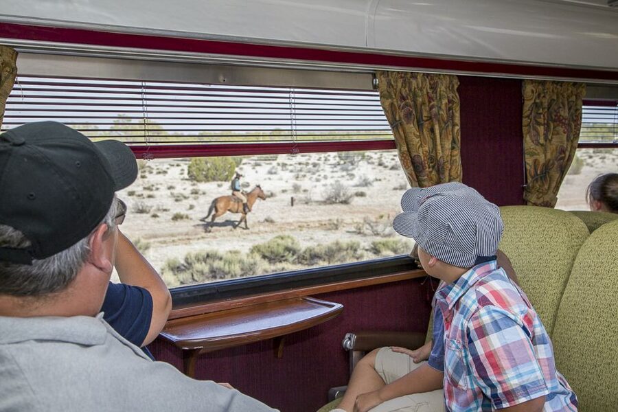 From Williams: Grand Canyon Railway Round-Trip Train Ticket - Onboard entertainment with real hosts, cowboys, and music
