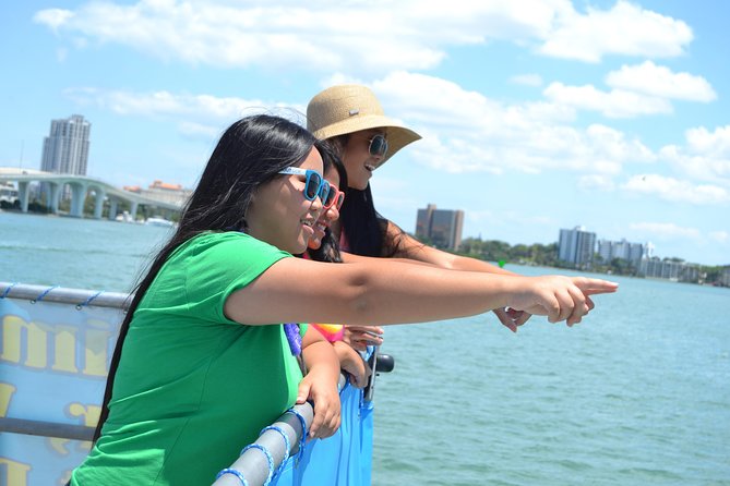 Guaranteed Dolphin Sighting Tour on Tropics Boat Tours - On-board commentary, music, and celebrity mansions along the way