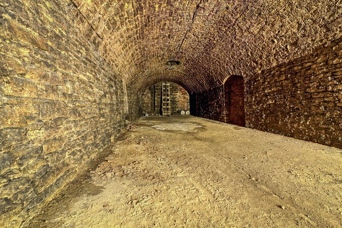 Hidden Brewery Caverns Tour in Cincinnati with Beer Tasting - Starting at Northern Row: the building, the Carnegie beams, and the warm-up
