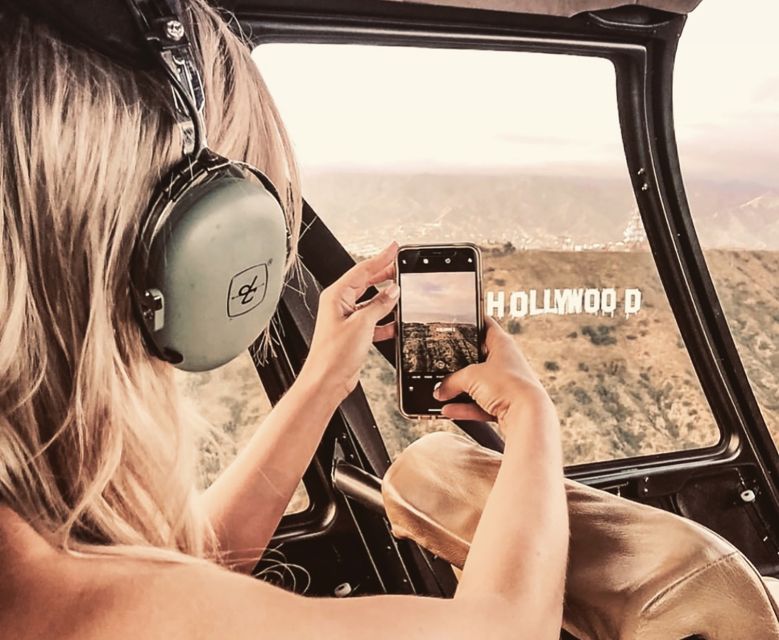 Hollywood & Beverly Hills Celebrity Helicopter Tour - Getting to the cockpit near Universal and Warner Bros