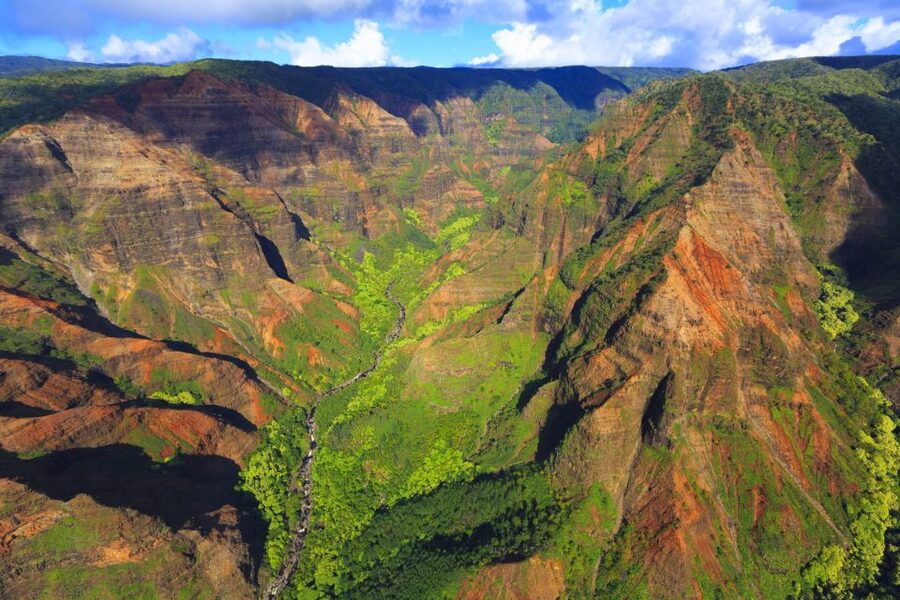 Lihue: Deluxe Waterfall Safari Helicopter Tour - Flying past the Na Pali Coast: where the cliffs feel real