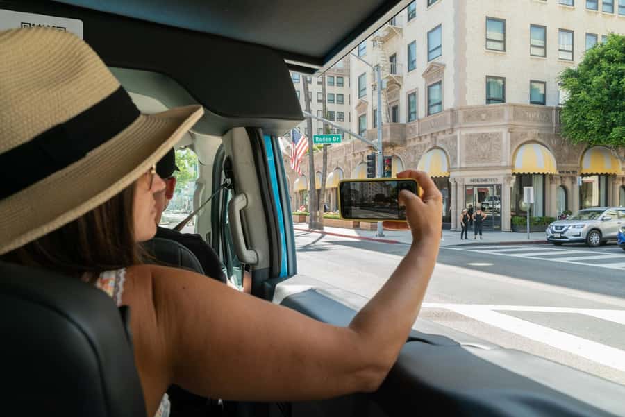 Los Angeles: Celebrity Homes and Hollywood Open-Air Bus Tour - Beverly Hills Sign Stop: Photos, Restroom, and Reality