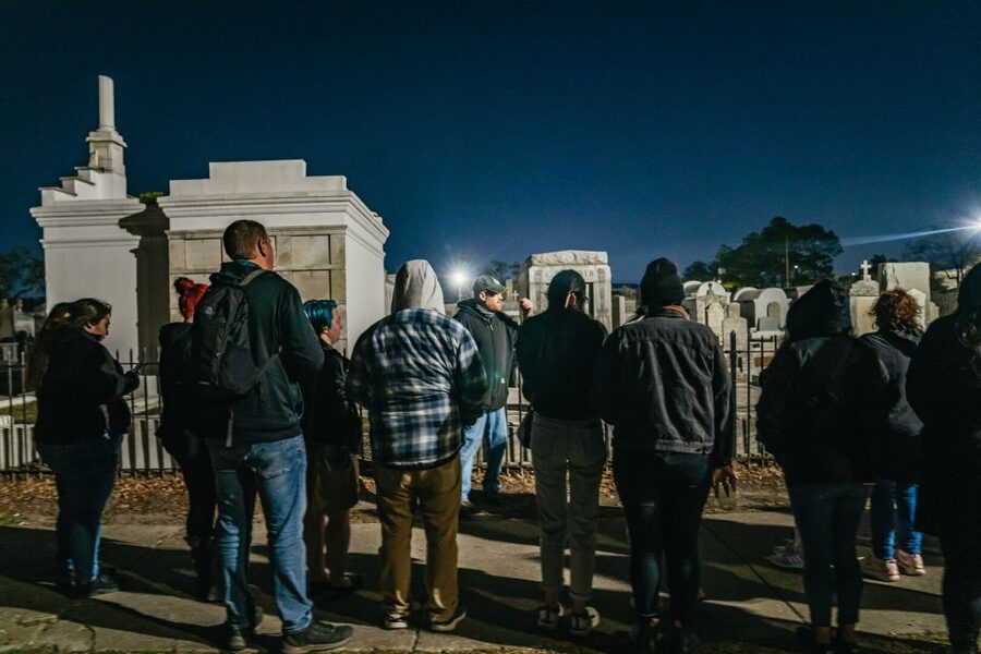 New Orleans: Cemetery Bus Tour At Dark with Exclusive Access - Charity Hospital Cemetery: Yellow Fever Burial Legacy at Night