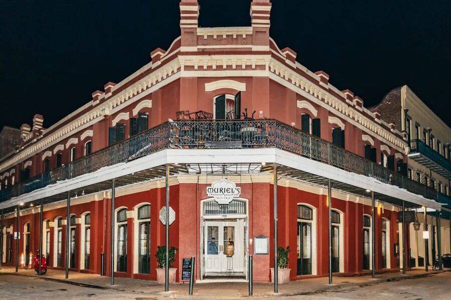 New Orleans: French Quarter Ghost Tour with Interior Visit - Lafitte’s Blacksmith Shop bar break and the walk toward Bourbon Orleans Hotel