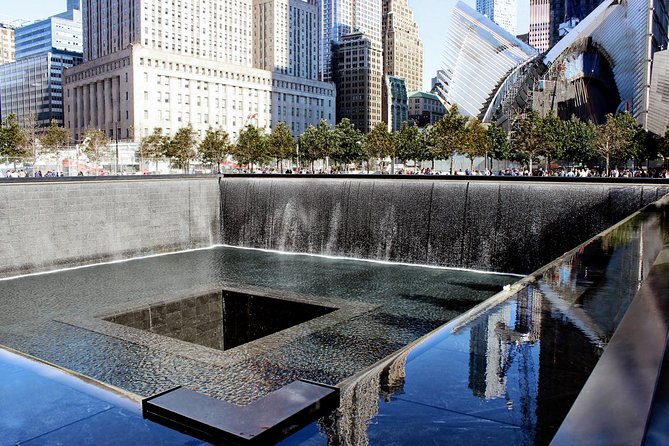 NYC City Tour: Statue of Liberty, 9/11 Memorial, Wall Street - Upgrading to Liberty Island: Reserved Ferry, Self-Guided Time, and Security