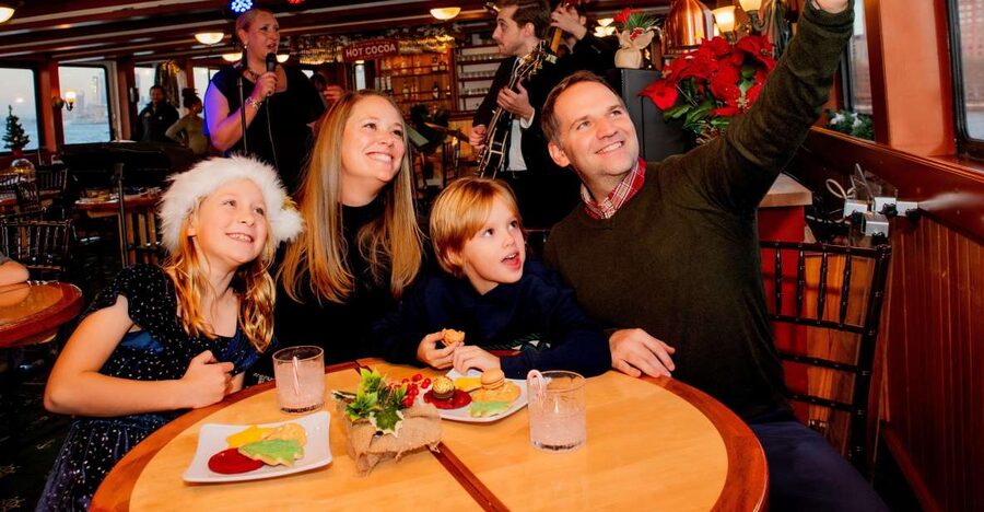 NYC: Holiday Yacht Cruise with Jazz, Cocoa & Carols - The Waterfront Route: Battery Park, Seaport, Liberty, and Ellis Island