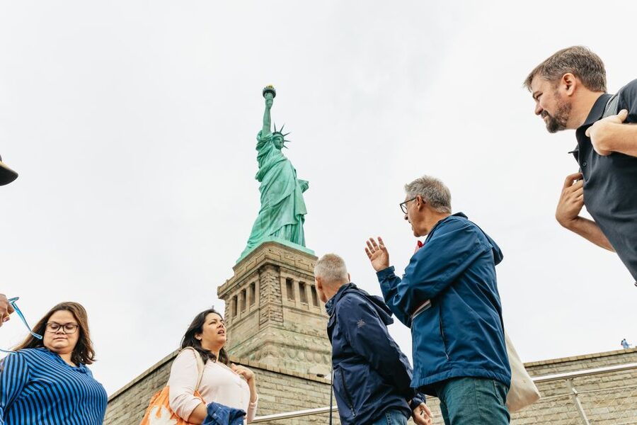 NYC: Statue of Liberty and Ellis Island Guided Tour - Battery Park to Liberty Island ferry: the views plus the context