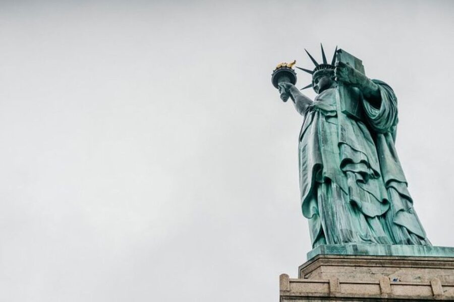 NYC: Statue of Liberty and Ellis Island Tour with Ferry - Logistics that affect comfort: walking, weather, and bags