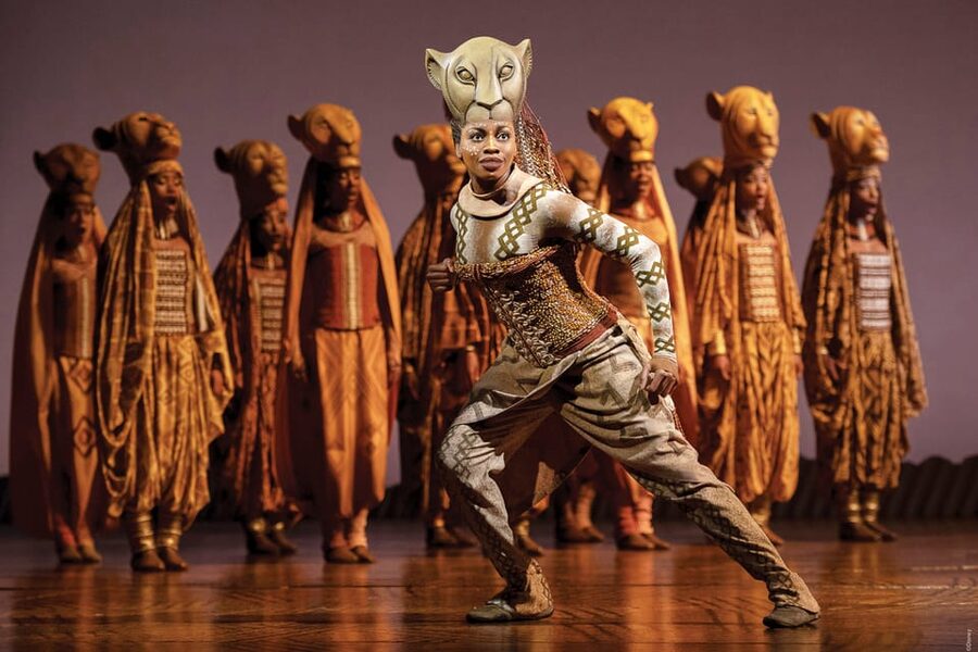 NYC: The Lion King on Broadway - The savanna on stage: giraffes, birds, and Pride Rock rising