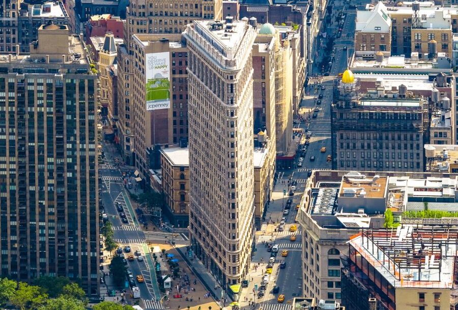NYC: Walking Tour with Local Guide and 30+ Top NYC Sights - Flatiron District and Midtown edge, where Manhattan posture becomes obvious