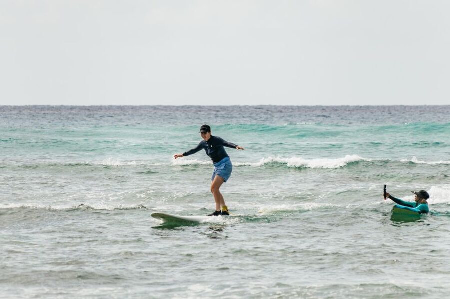 Oahu: Beginner-Friendly Waikiki Beach Surfing Lesson - Gear that reduces friction, plus what to bring yourself