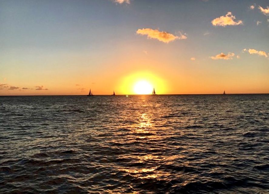 Oahu: Waikiki Glass Bottom Boat Sunset Cruise - Why a Waikiki Sunset Cruise Beats a Quick Walk on the Beach