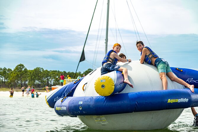 Shell Island Inflatable Adventure Park & Dolphin Sightseeing Tour - Dock walk, meeting point, and the smooth start you want