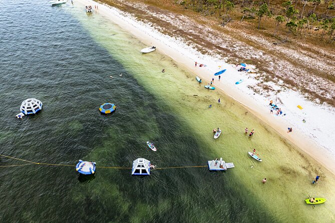 Shell Island Inflatable Adventure Park & Dolphin Sightseeing Tour - Choosing your comfort level: active fun or chill cruising around