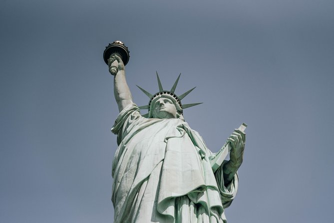 Statue of Liberty and Ellis Island Guided Tour with Ferry - Battery Park and Castle Clinton: Setting the Scene Before You Sail