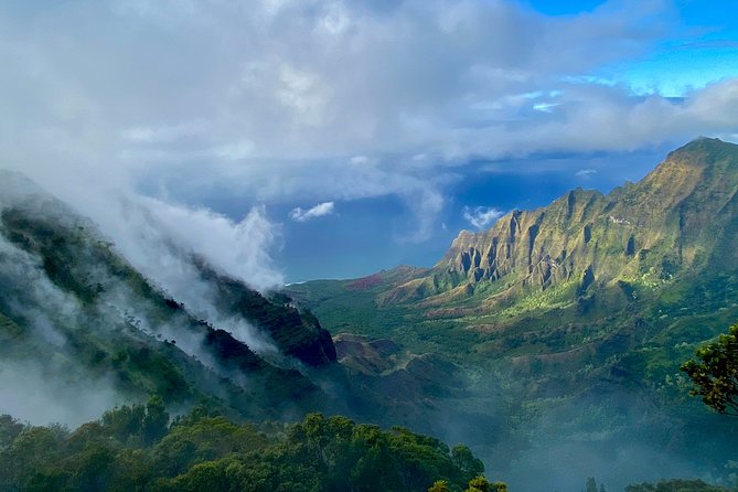 Waimea Canyon Downhill Bike Ride - The bike handoff: hybrid bikes, gloves, helmet, and road reality