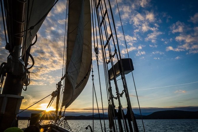Windjammer Classic Sunset Sail from Camden, Maine - Helping raise the sails, then steering at the wheel